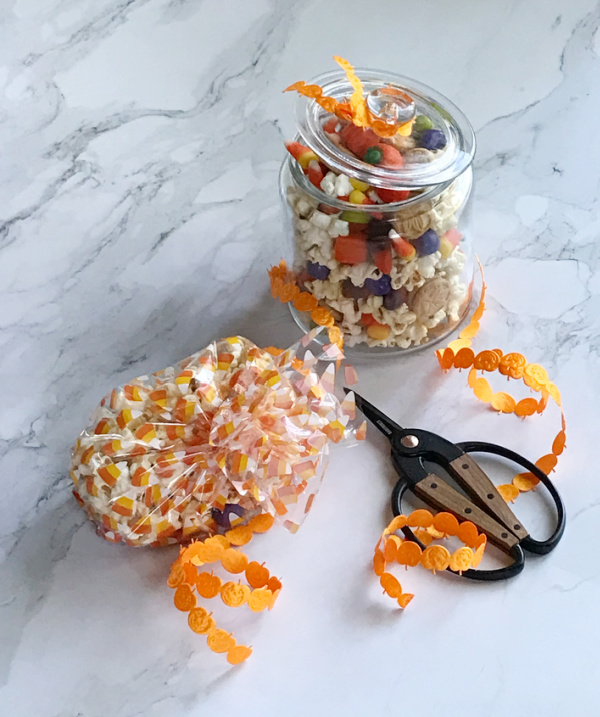snack mix in a jar and cello bags.