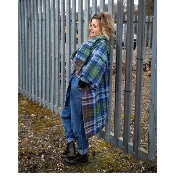 Woman wearing a Prickly Thistle tartan coat