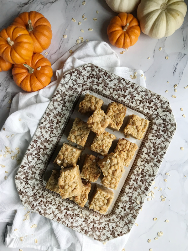 Pumpkin Streusel pie bars on a brown and white transfer ware plate