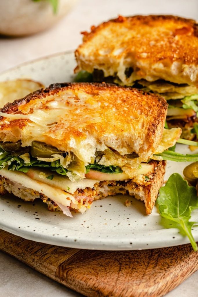 The Ultimate Spicy Cheddar & Apple Fall Veggie Sandwich from Ambitious Kitchen. 