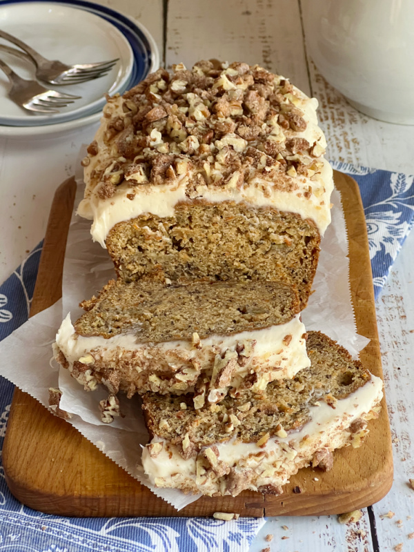 Sliced banana carrot bread with cream cheese frosting