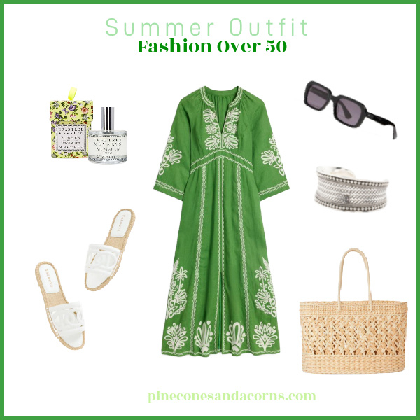 Fashion over 50 Green Caftan outfit with white sandals, black glasses, a wicker tote and perfume with a silver bangle bracelet. 