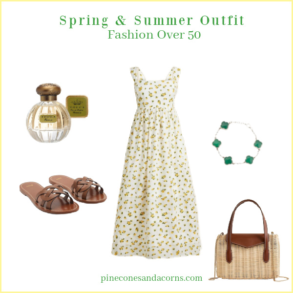 Fashion over 50 Spring and Summer Yellow Flower Dress Outfit with a green and gold bracelet, a bottle of Toca perfume, tan sandals and a tan leather and wicker bag.