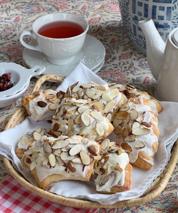 almond bear claw pastries with a cup of tea.
