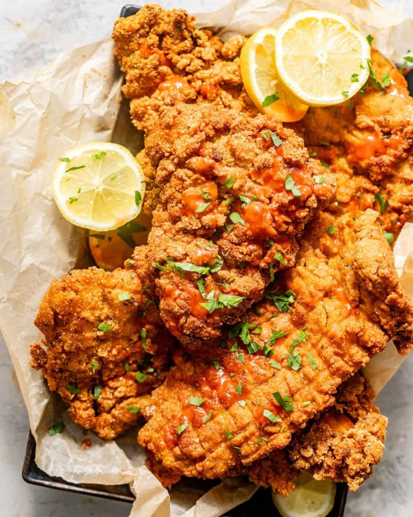 Fried Catfish with lemons.
