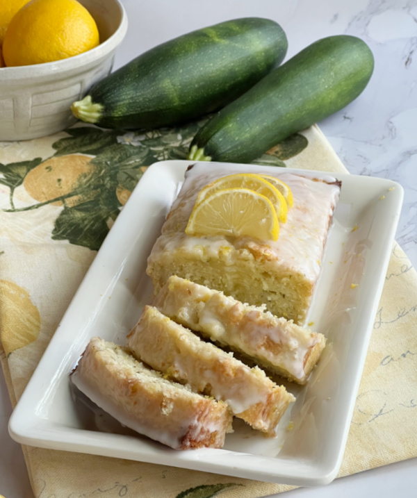 zucchini and lemons with sliced bread.