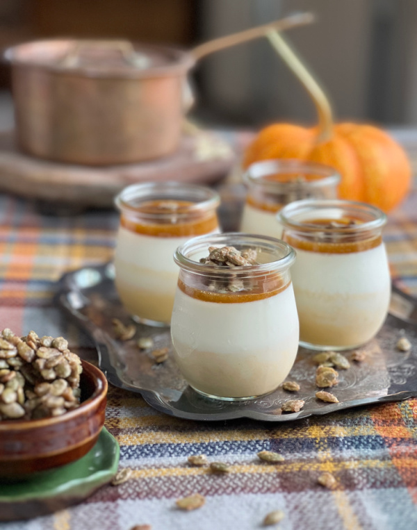 Pumpkin Panna Cotta with Bonne Maman pumpkin spread a pumpkin an d a copper pot.