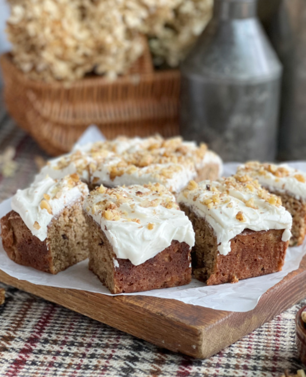 sliced zucchini cake with cream cheese frosting.