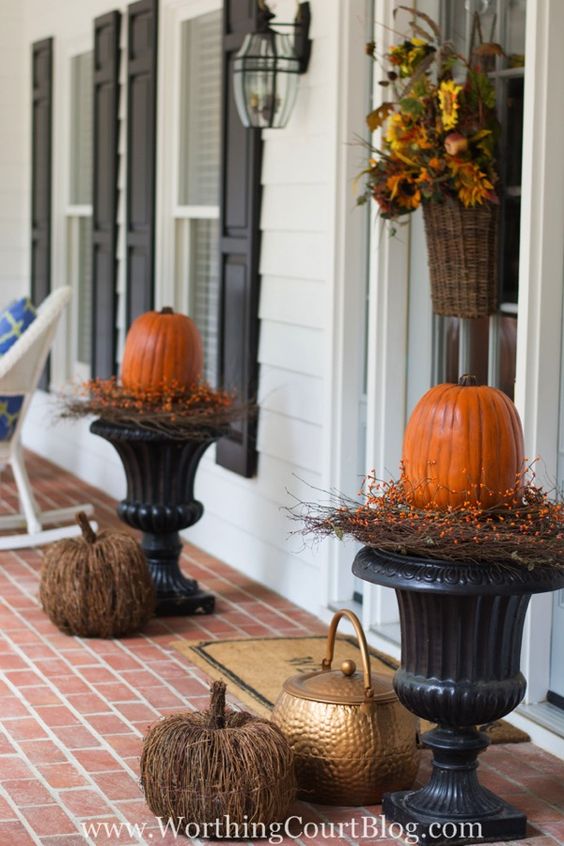 black urns wicker pumpkins. 