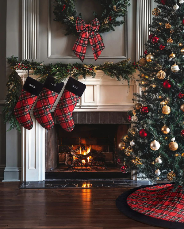 plaid stockings hung by the fireplace and a tree.