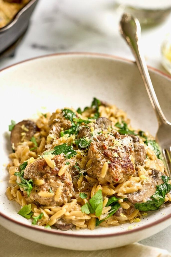 One-Pot Mushroom Orzo with Spinach and Meatballs.