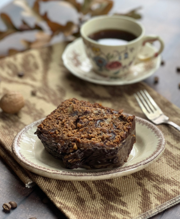 slice of date cake with cup of tea.