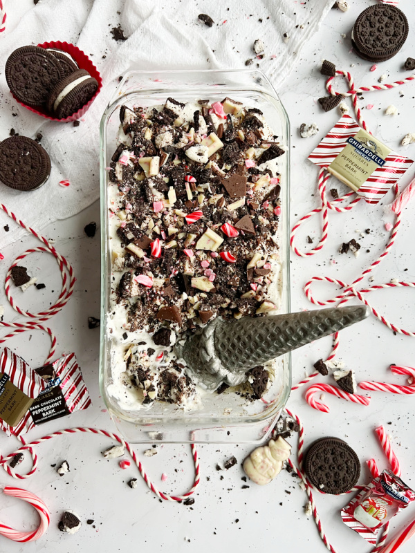 No Churn peppermint bark ice cream with cookies and an ice cream scoop.