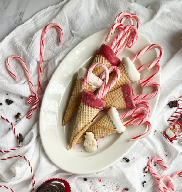 Red and White Dipped sugar cones with candy canes.
