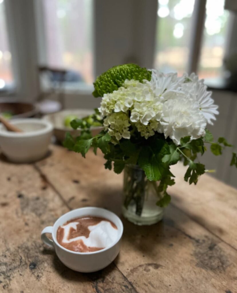 Monday Musings — cup of hot chocolate on kitchen table on a slow Monday morning.