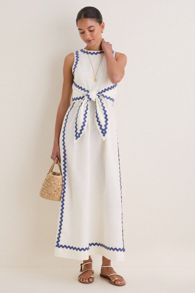 White dress with blue ric rack