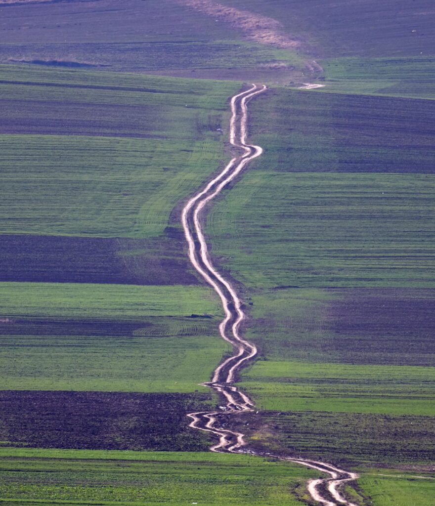 A winding road of possibility