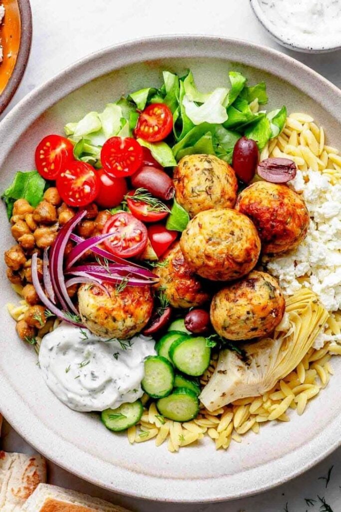 Mediterranean meatball bowls with orzo and tzatziki