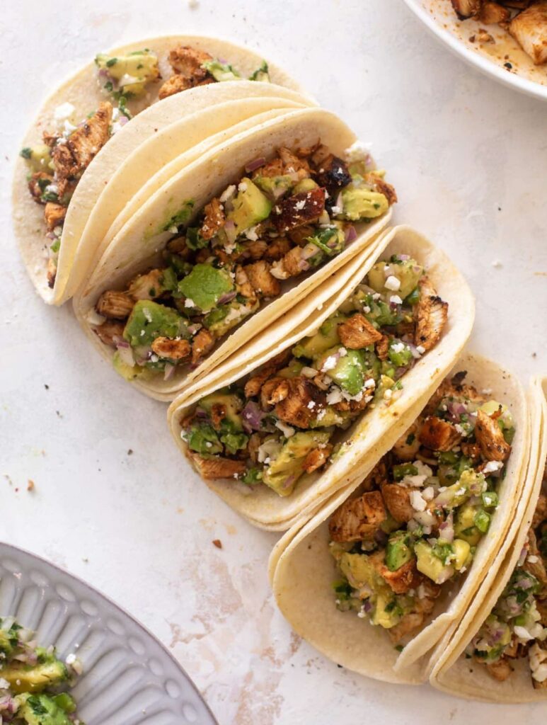 Hot Honey Chipotle Chicken Tacos from How Sweet Eats