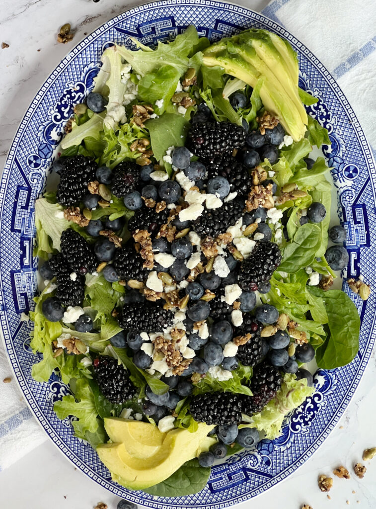 Blueberry Blackberry Salad on a blue and white oval transferware plate