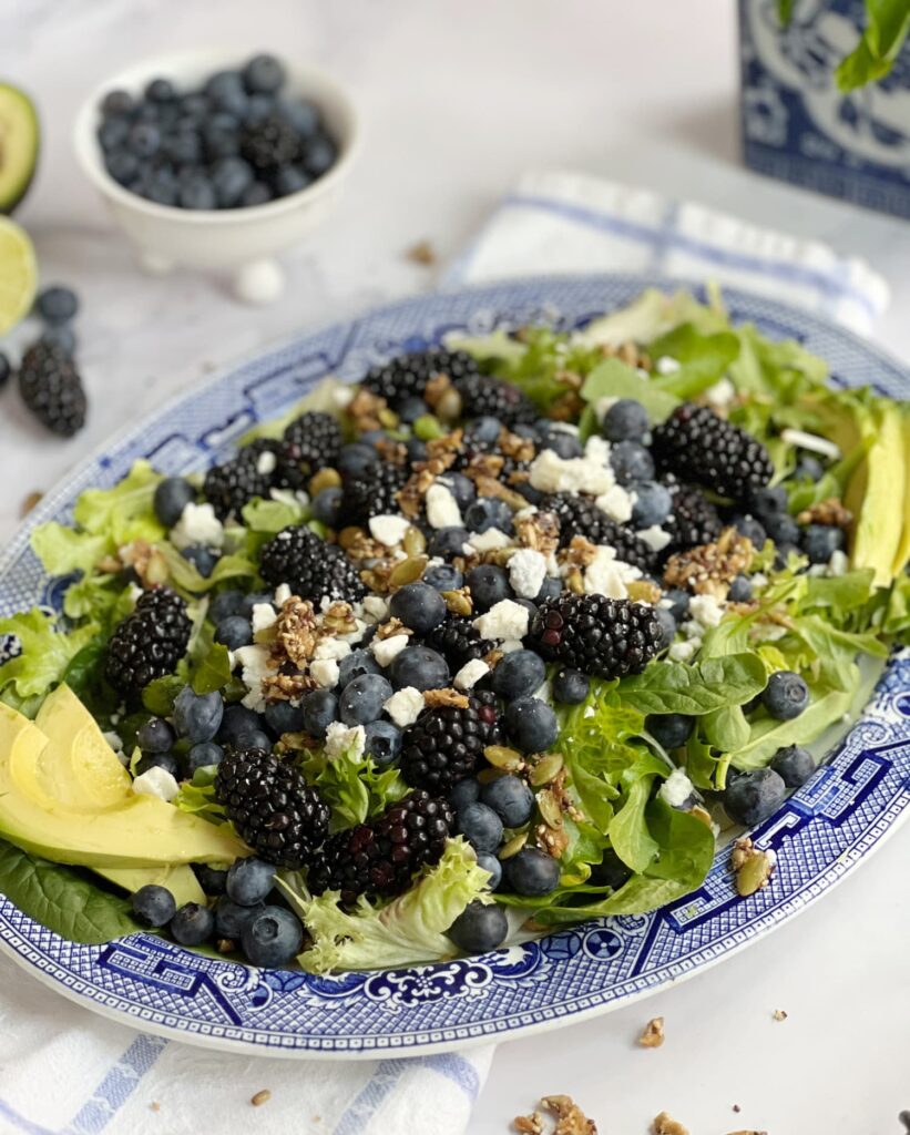 Fresh blueberries, blackberries, blue cheese, candied walnuts, and honey vinaigrette make this a summer salad I come back to all season long.