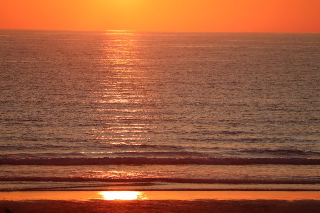 July sunset at the ocean