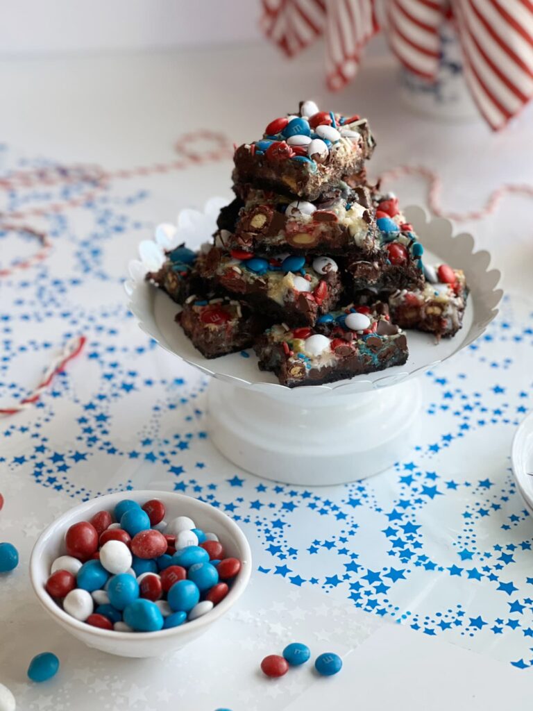 Patriotic Magic Cookie Bars on a white platter