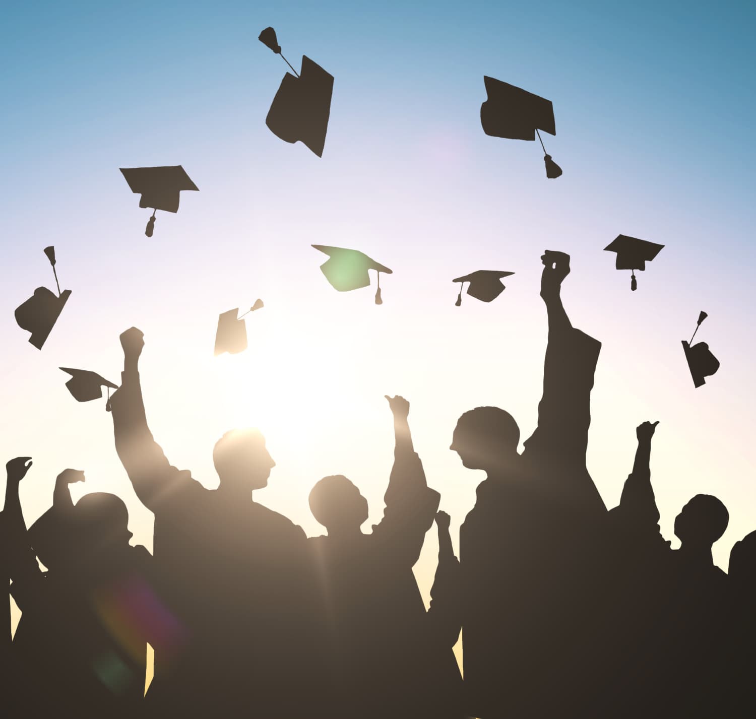 Monday Musings Students Graduating and throwing caps in the air.