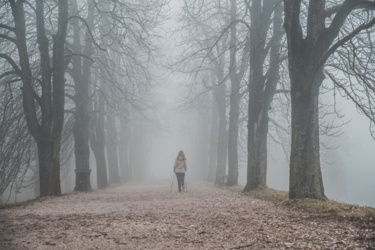 Woman walking in the mist of menopause