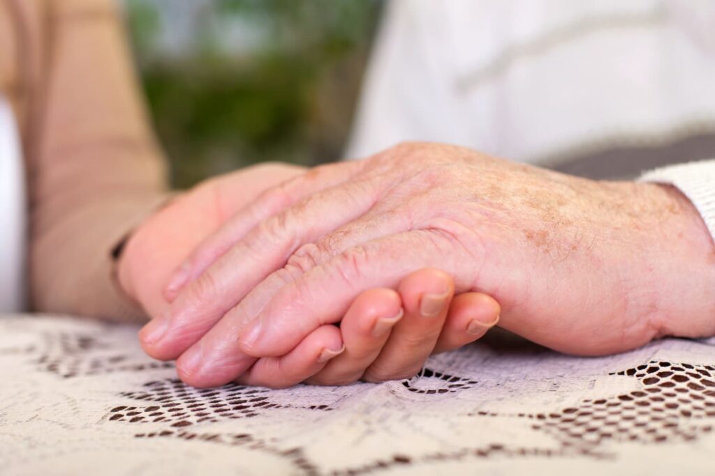 Two hands clasped