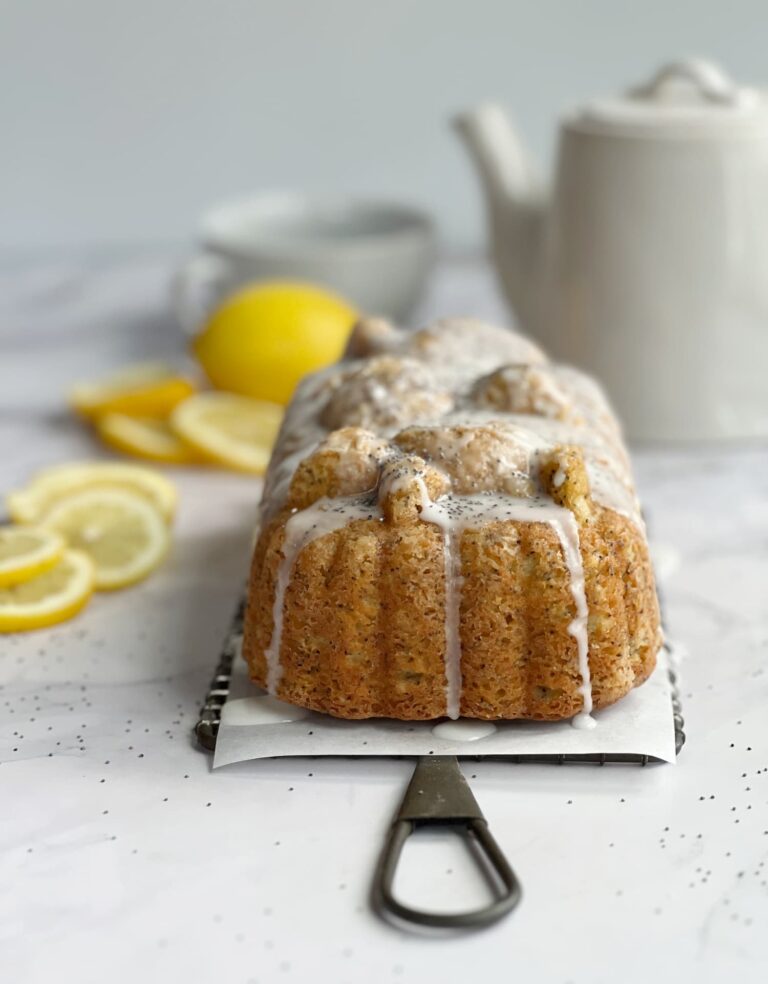 lemon poppyseed loaf cake on a wire rack