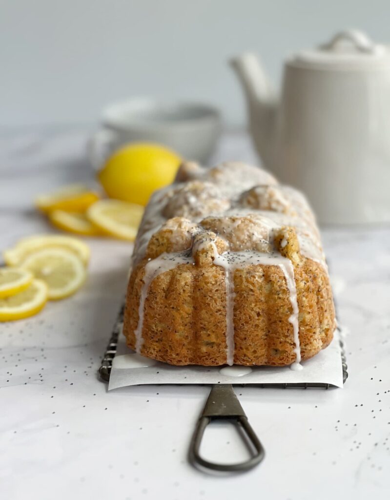 lemon poppyseed loaf cake on a wire rack