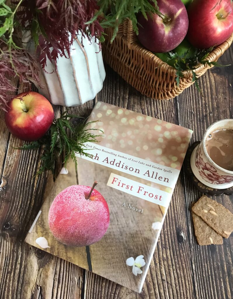 analog bag contents with book, hot chocolate and apples for fall