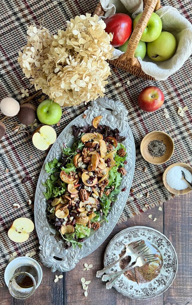 Flatlay of roasted apple salad with maple vinagrette