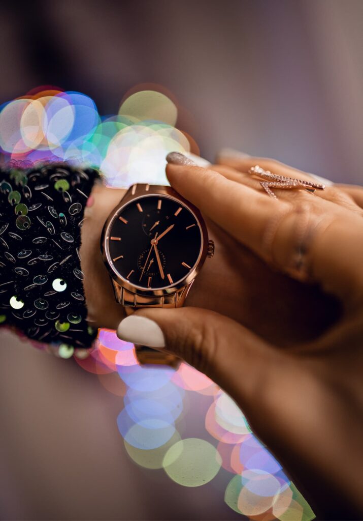 Woman checking her watch at a party